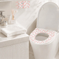 Housse de protection jetable pour siège de toilette