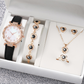 Ensemble montre à quartz et bijoux 5 pièces pour femme – Montre élégante à motif floral, bracelet, collier, boucles d'oreilles et bague assortis – Idéal pour un anniversaire, la fête des mères ou toute autre occasion spéciale.
